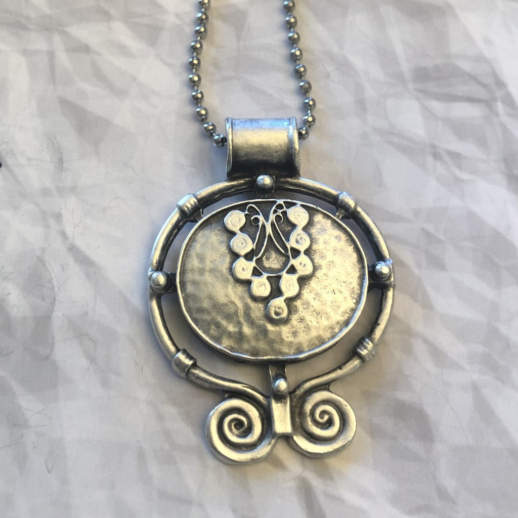 Silver hammered pendant necklace