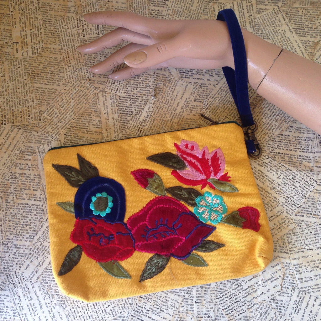 embroidered floral yellow wristlet