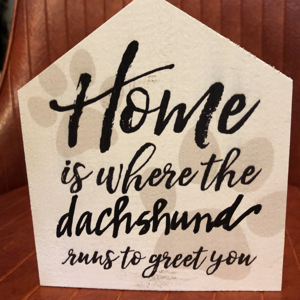 Sign: Home is where the....runs to greet you